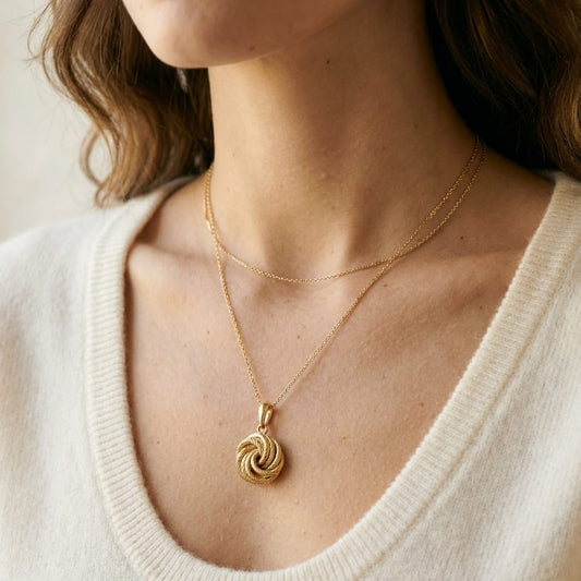 14K Yellow Gold Singapore Chain with Love Knot Pendant, 18 Inch, worn close-up portrait