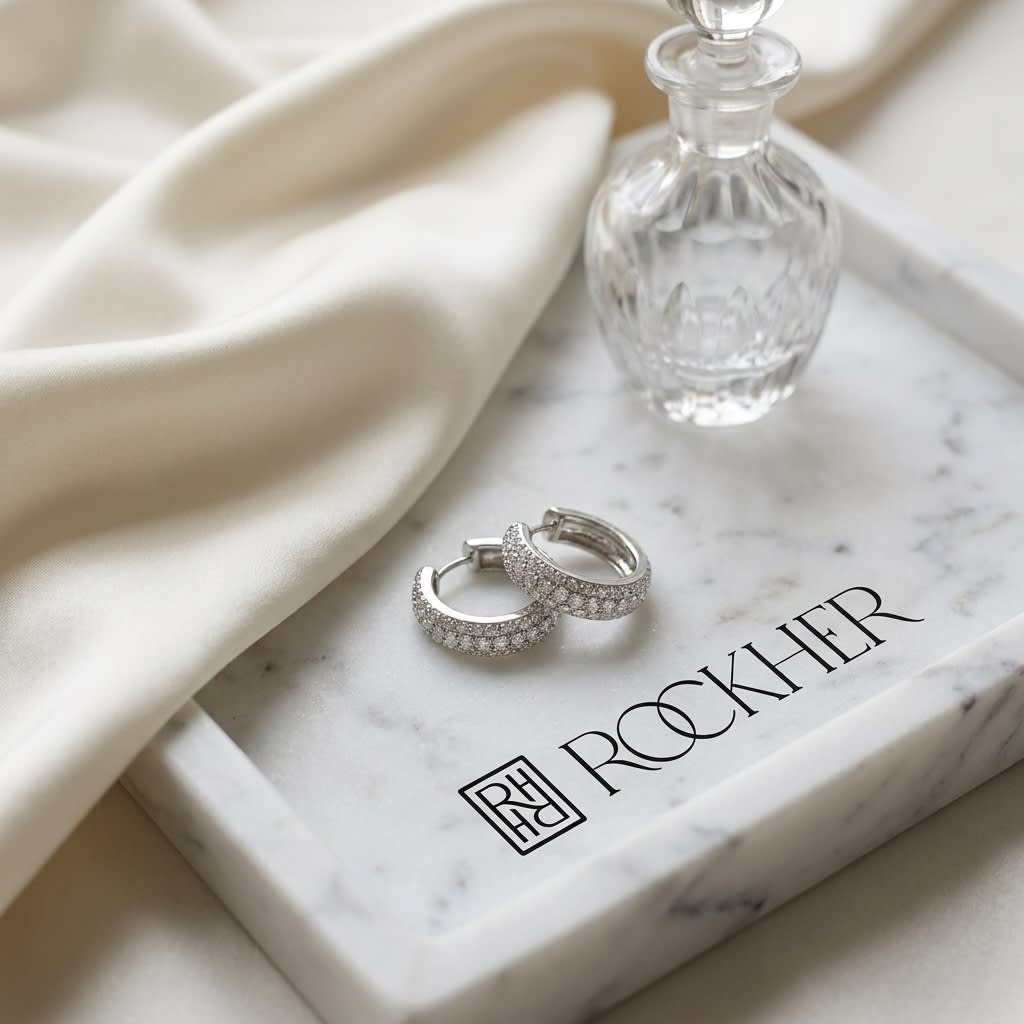 Diamond Pavé Hoop Earrings in 14K White Gold, on marble vanity tray with silk