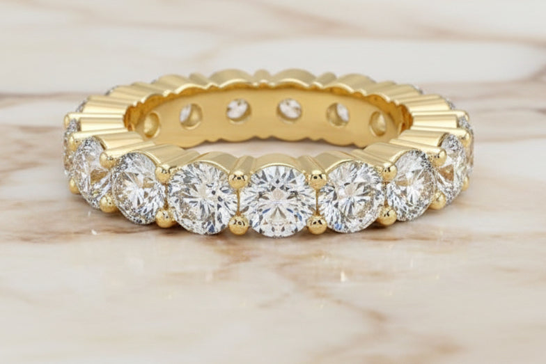 Round brilliant lab diamond eternity band in 14K yellow gold — profile