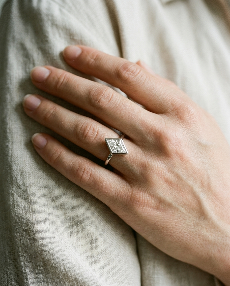 The Agnes Select bezel solitaire kite engagement ring in platinum — on hand — RockHer