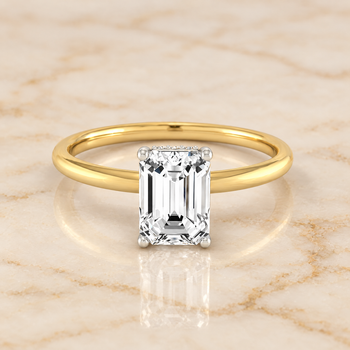 The Eartha Upper Hidden Halo Solitaire Emerald Cut Engagement Ring Setting in 18K Yellow Gold