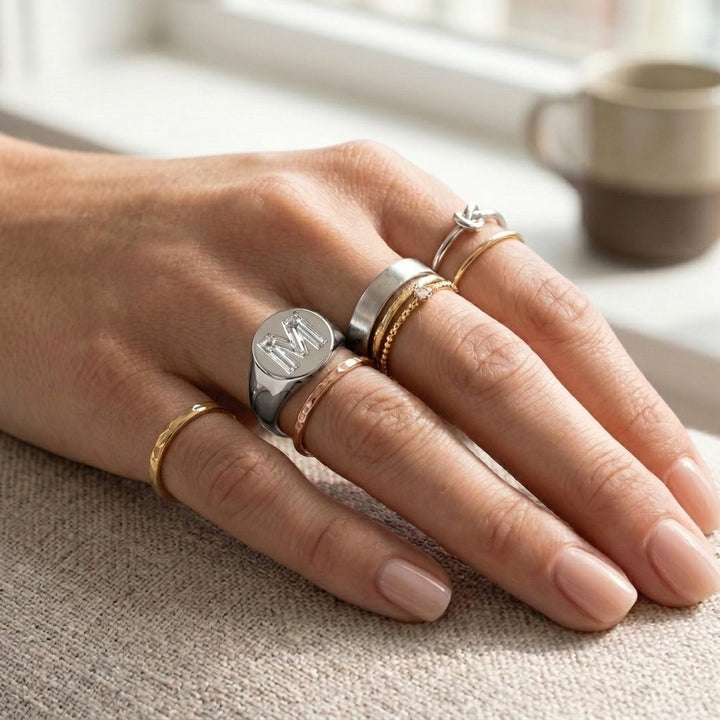 Women's Round lab-grown diamond letter signet ring in 14K White Gold, letter M, worn on hand