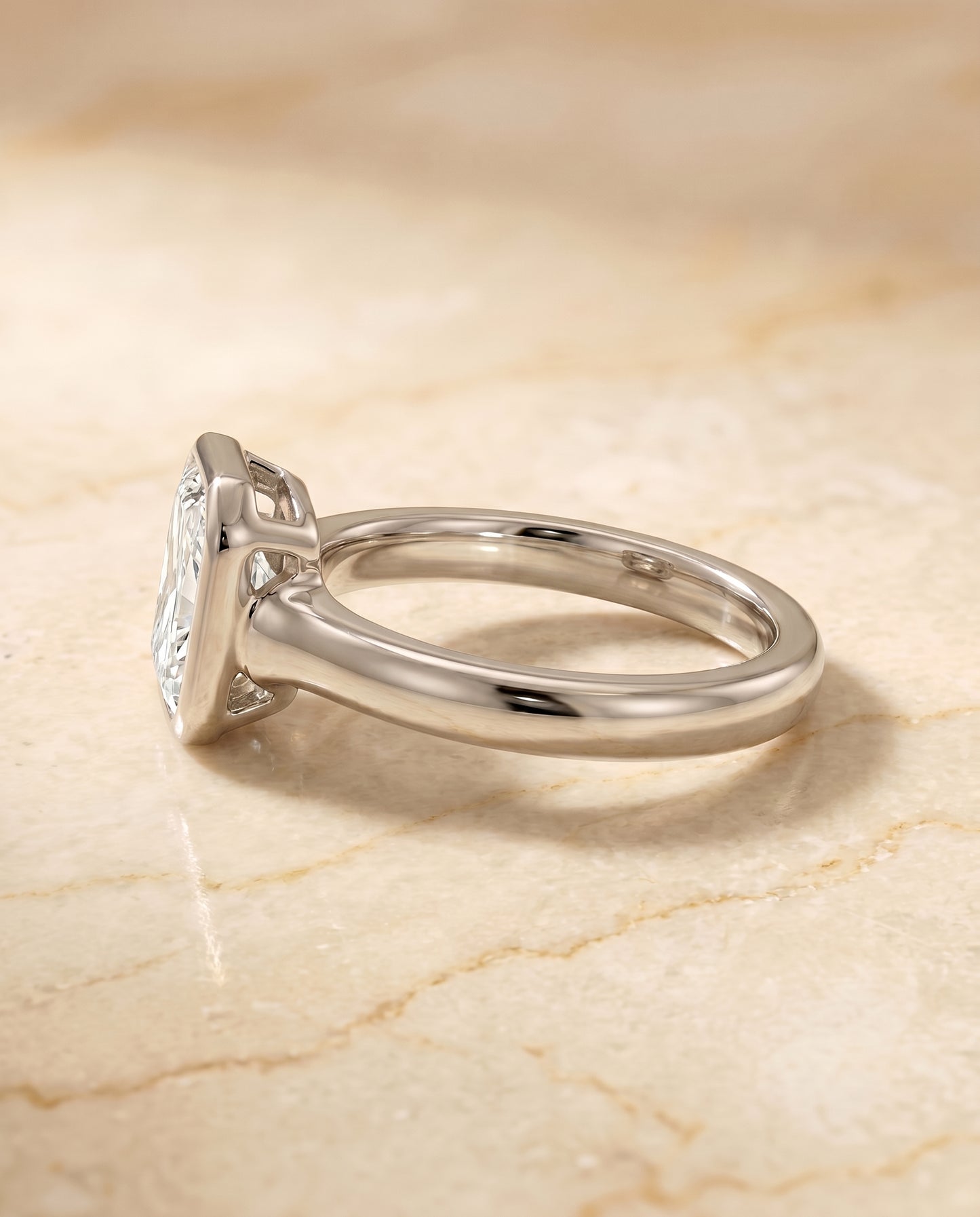 The Agnes Bezel Solitaire In Radiant Cut Engagement Ring Setting in Platinum