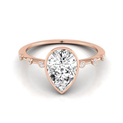 14kr Bezel Set Pear Engagement Ring With 6 Bezel Set Round Diamonds On Shank