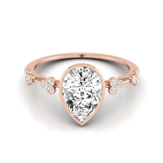 14kr Bezel Set Pear Engagement Ring With 12 Clover Bezel Set Round Diamonds On Shank