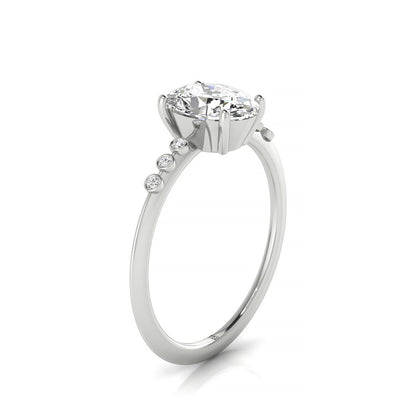 Plat Oval Engagement Ring With 6 Bezel Set Round Diamonds On Shank
