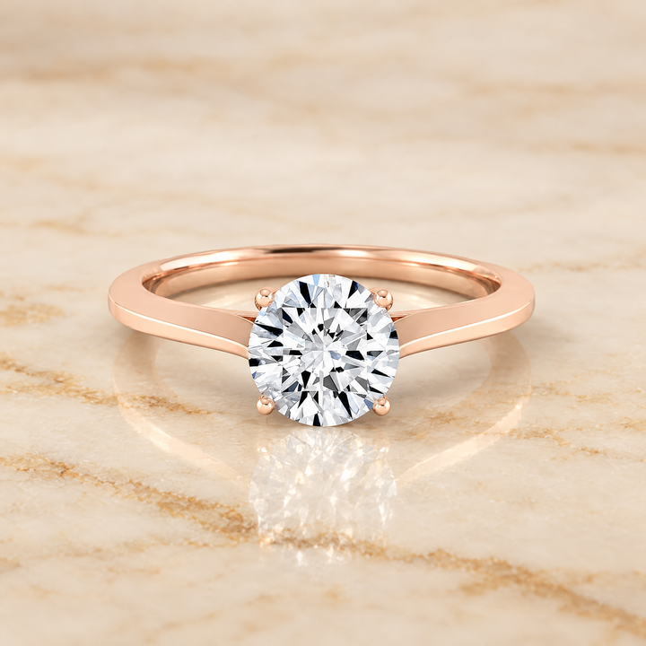 The Elena Timeless Graduated Beveled Shank Solitaire Round Engagement Ring Setting in 14K Rose Gold