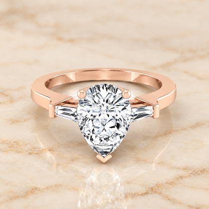 The June Three Stone Pear Engagement Ring Setting in 14K Rose Gold