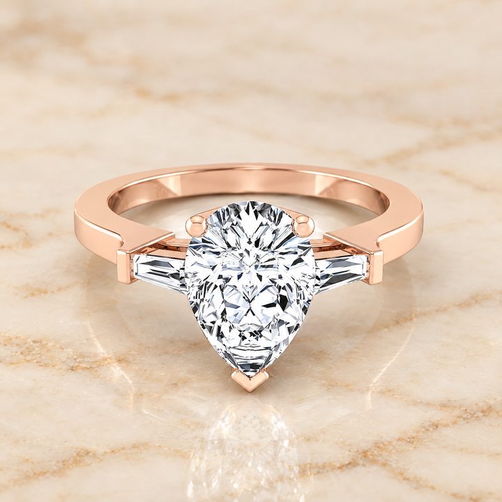 The June Three Stone Pear Engagement Ring Setting in 14K Rose Gold