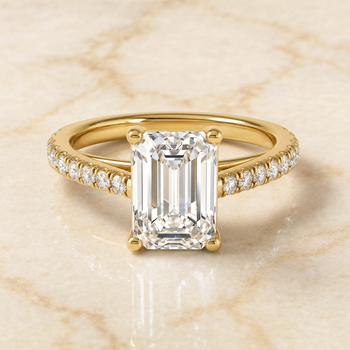 The Donna Cathedral French Pavé Solitaire Emerald Cut Engagement Ring Setting in 18K Yellow Gold