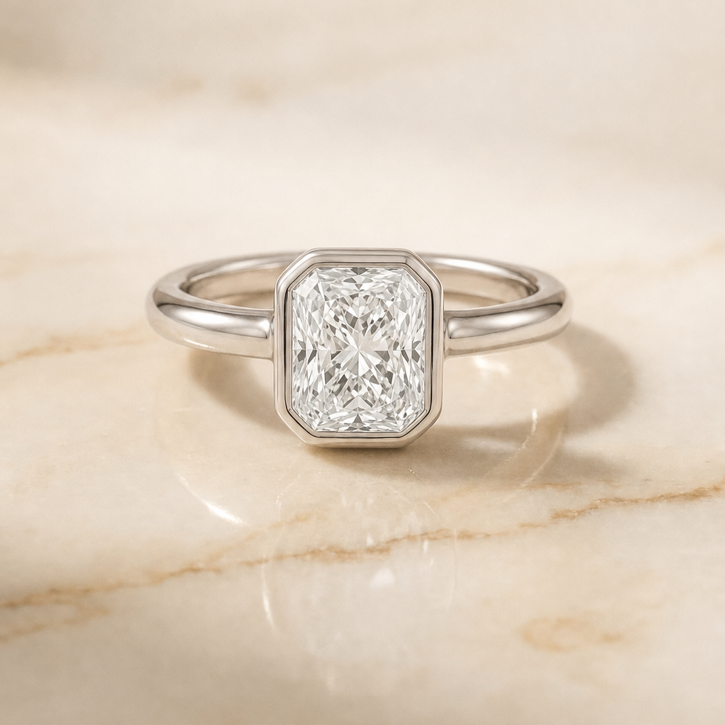 The Agnes Bezel Solitaire In Radiant Cut Engagement Ring Setting in Platinum
