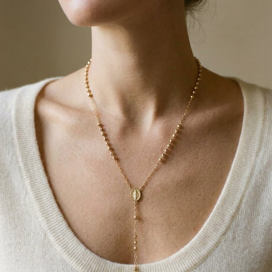 14K Yellow Gold Beaded Station Chain with Cross, 26 Inch, worn close-up portrait