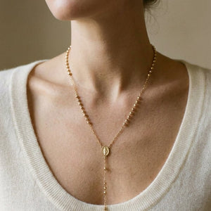 14K Yellow Gold Beaded Station Chain with Cross, 26 Inch, worn close-up portrait