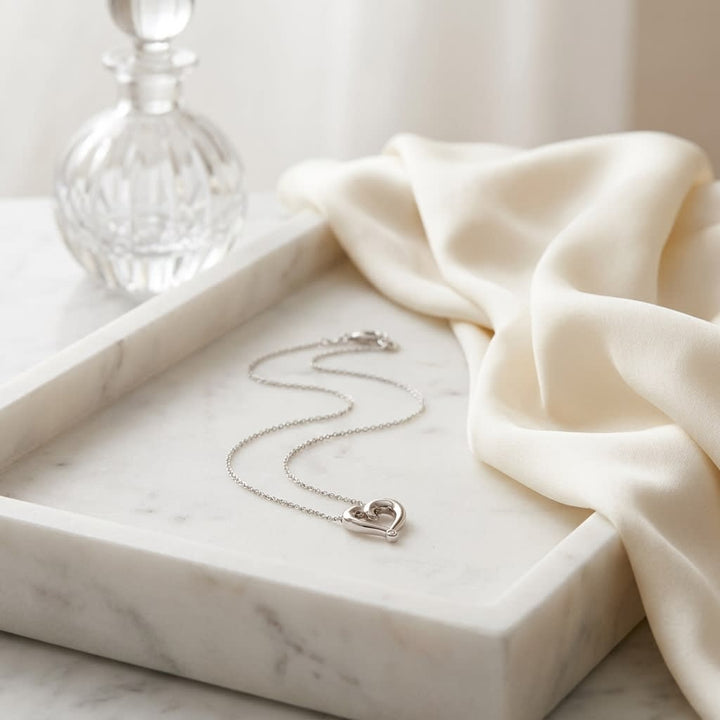 14K White Gold Cable Chain with Rose Gold Heart Pendant, 16 Inch, on marble vanity tray with silk