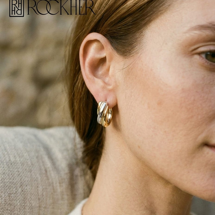 14K Two-Tone Gold Sculpted Hoop Earrings, worn close-up portrait