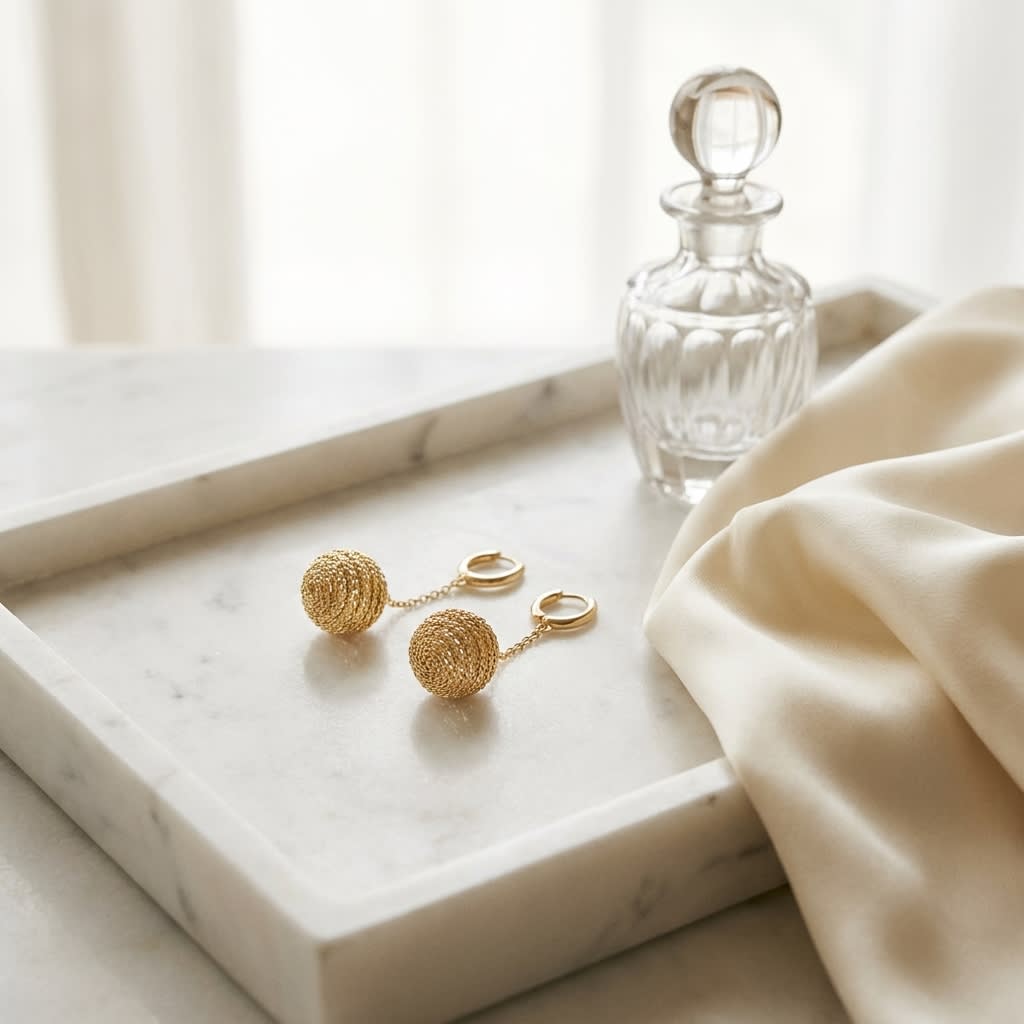 14K Two-Tone Gold Modern Drop Earrings, on marble vanity tray with silk