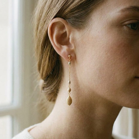 14K Tri-Color Gold Drop Earrings, worn close-up portrait