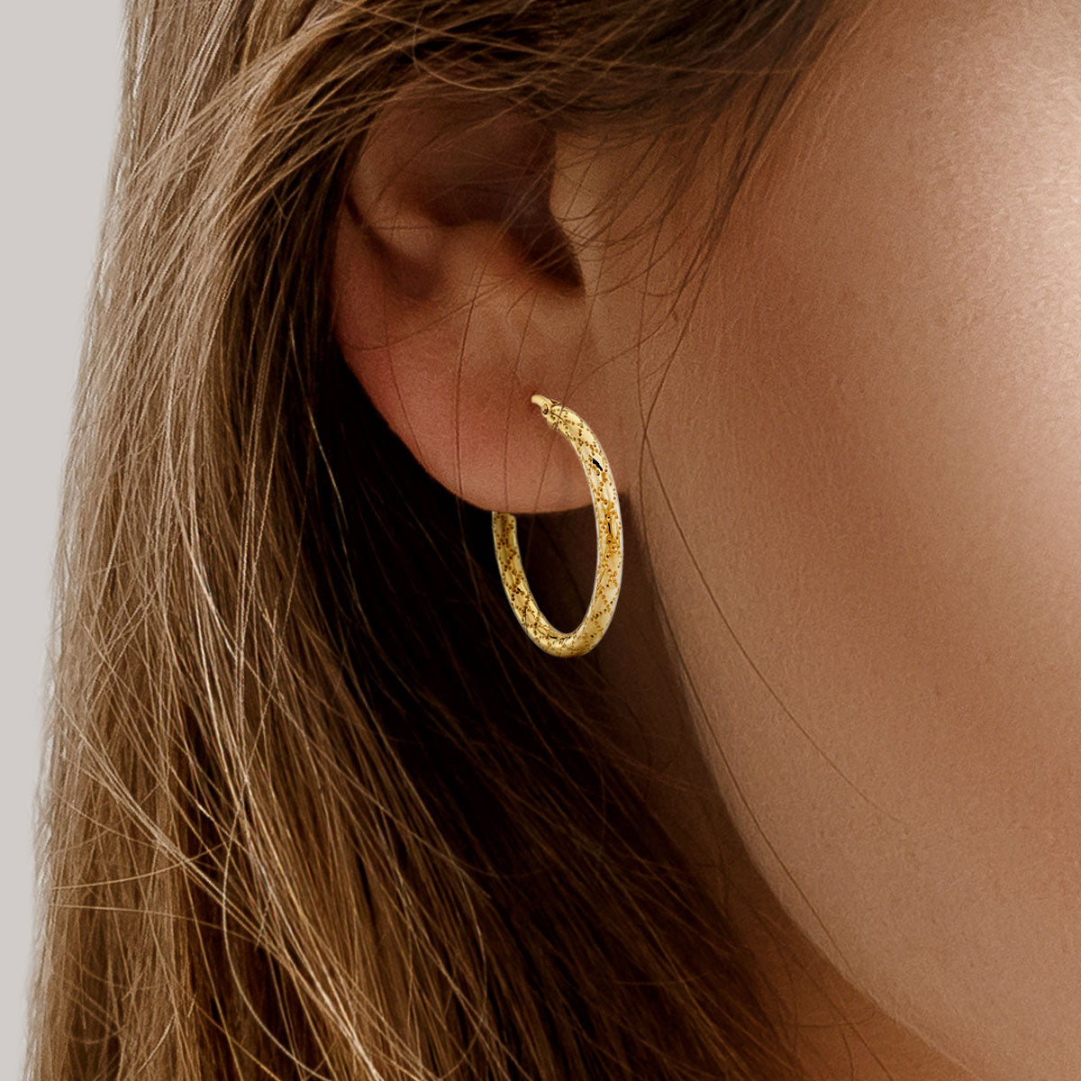 14K Yellow Gold Textured Hoop Earrings – detail view | RockHer
