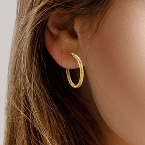 14K Yellow Gold Textured Hoop Earrings – detail view | RockHer