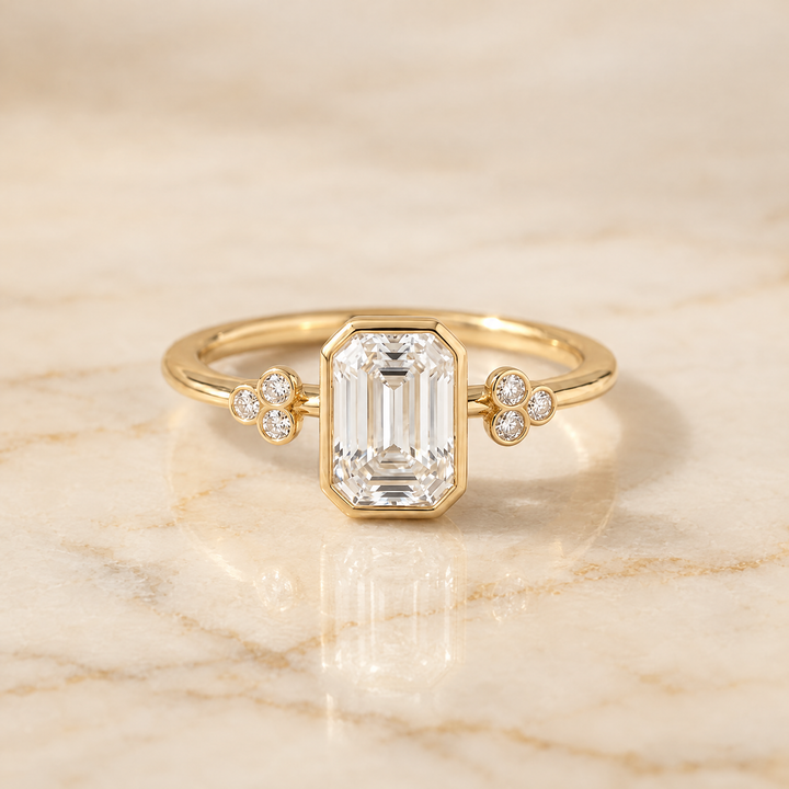 Emerald engagement ring setting in 18K Yellow Gold, Selena Clover Bezel Accent Solitaire Emerald Cut | RockHer