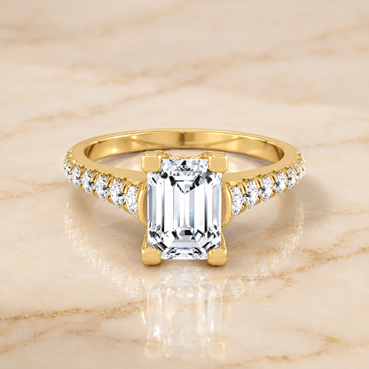 The Mimi Graduated Linear Pavé Emerald Cut Engagement Ring Setting in 18K Yellow Gold