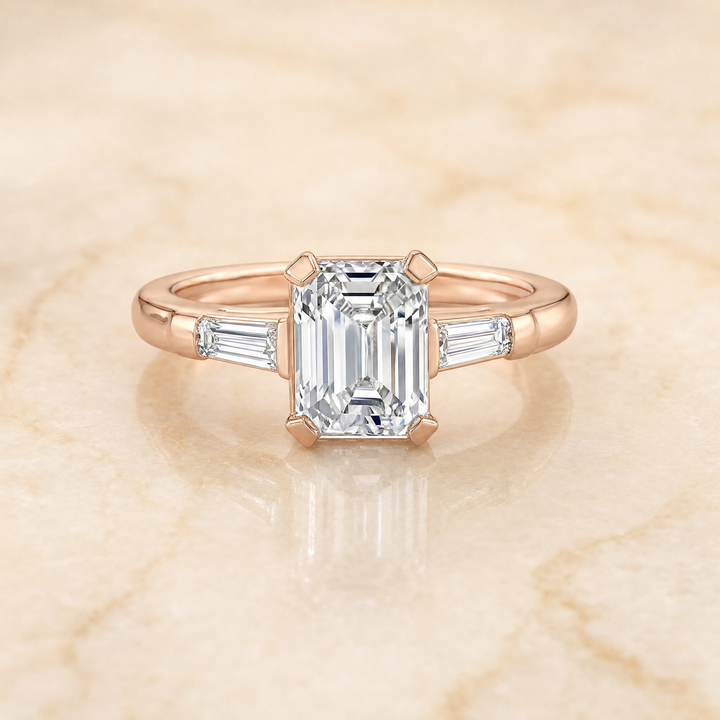 The Caroline Three Stone Emerald Cut Engagement Ring Setting in 14K Rose Gold