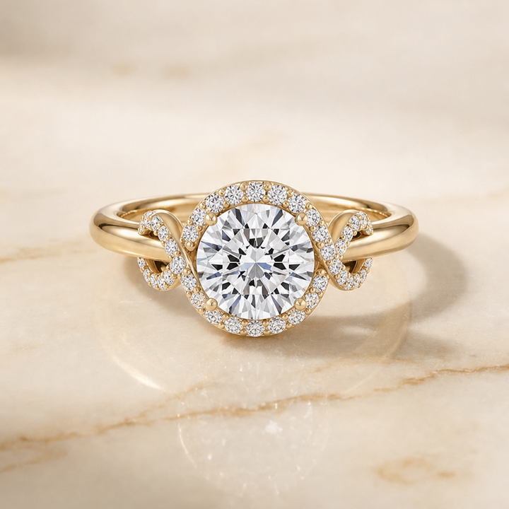The Calista Love Knot Halo Round Engagement Ring Setting in 18K Yellow Gold