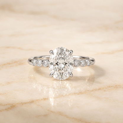 The Peggy Bezel Accent Solitaire Oval Engagement Ring Setting in Platinum