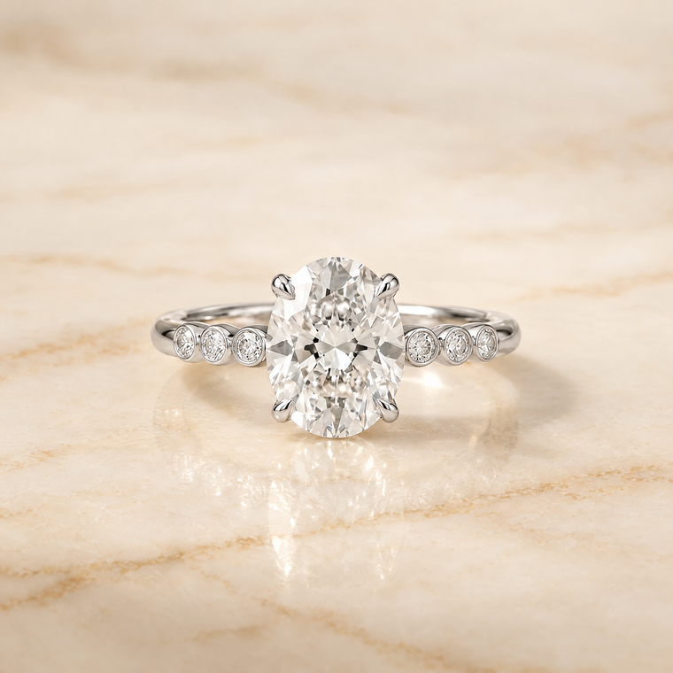 The Peggy Bezel Accent Solitaire Oval Engagement Ring Setting in Platinum
