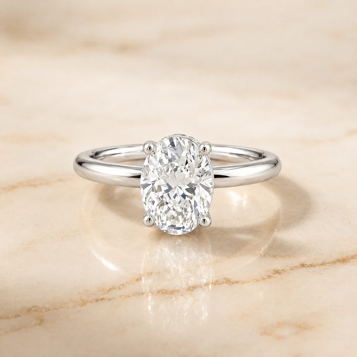 The Joni Hidden Halo Solitaire Oval Engagement Ring Setting in Platinum