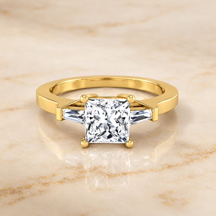 The June Three Stone Princess Cut Engagement Ring Setting in 18K Yellow Gold