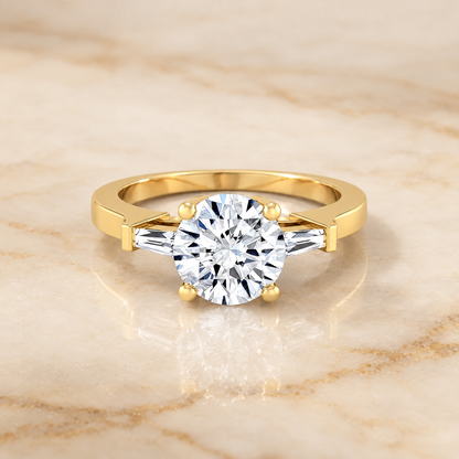 The June Three Stone Round Engagement Ring Setting in 18K Yellow Gold