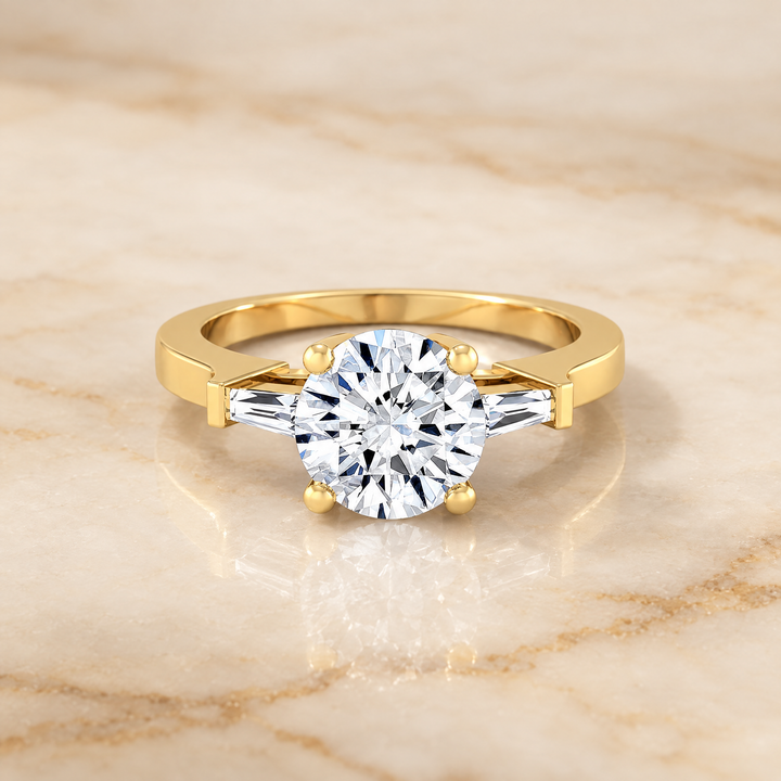 The June Three Stone Round Engagement Ring Setting in 18K Yellow Gold