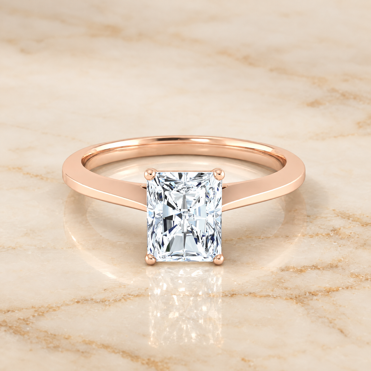 The Elena Timeless Graduated Beveled Shank Solitaire Radiant Cut Engagement Ring Setting in 14K Rose Gold