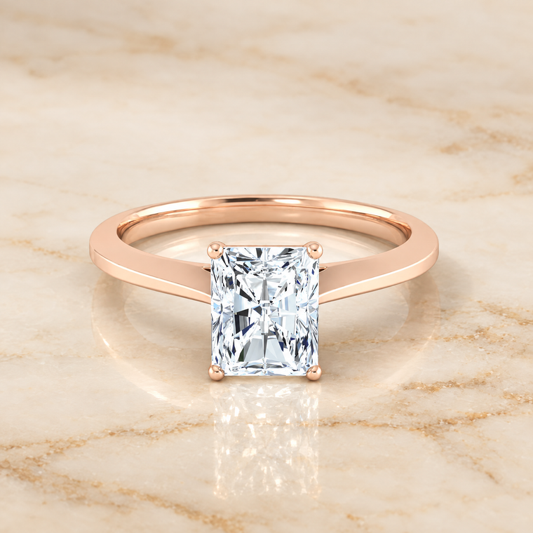 The Elena Timeless Graduated Beveled Shank Solitaire Radiant Cut Engagement Ring Setting in 14K Rose Gold