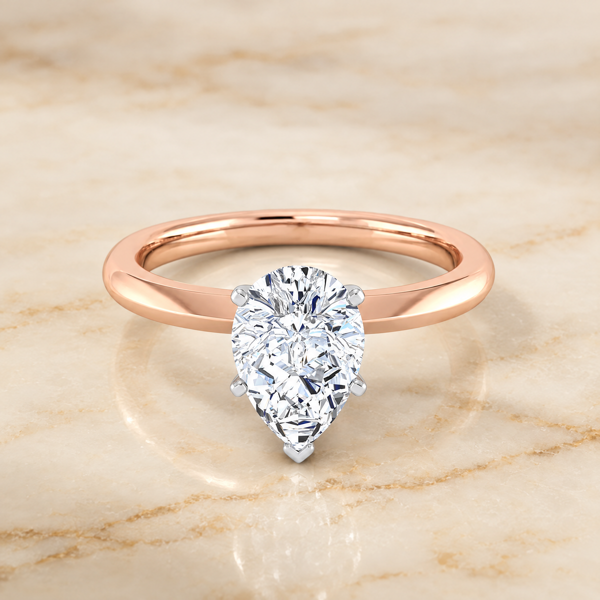 The Isolde Petite Knife Edge Solitaire Pear Engagement Ring Setting in 14K Rose Gold