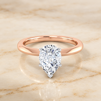 The Isolde Petite Knife Edge Solitaire Pear Engagement Ring Setting in 14K Rose Gold