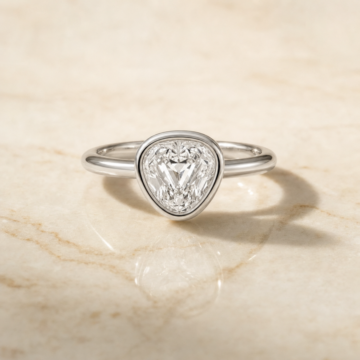 The Agnes Bezel Solitaire In Shield Engagement Ring Setting in Platinum