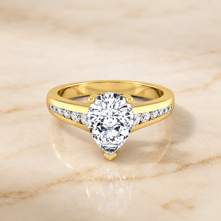 The Stevie Contemporary Channel Pear Engagement Ring Setting in 18K Yellow Gold