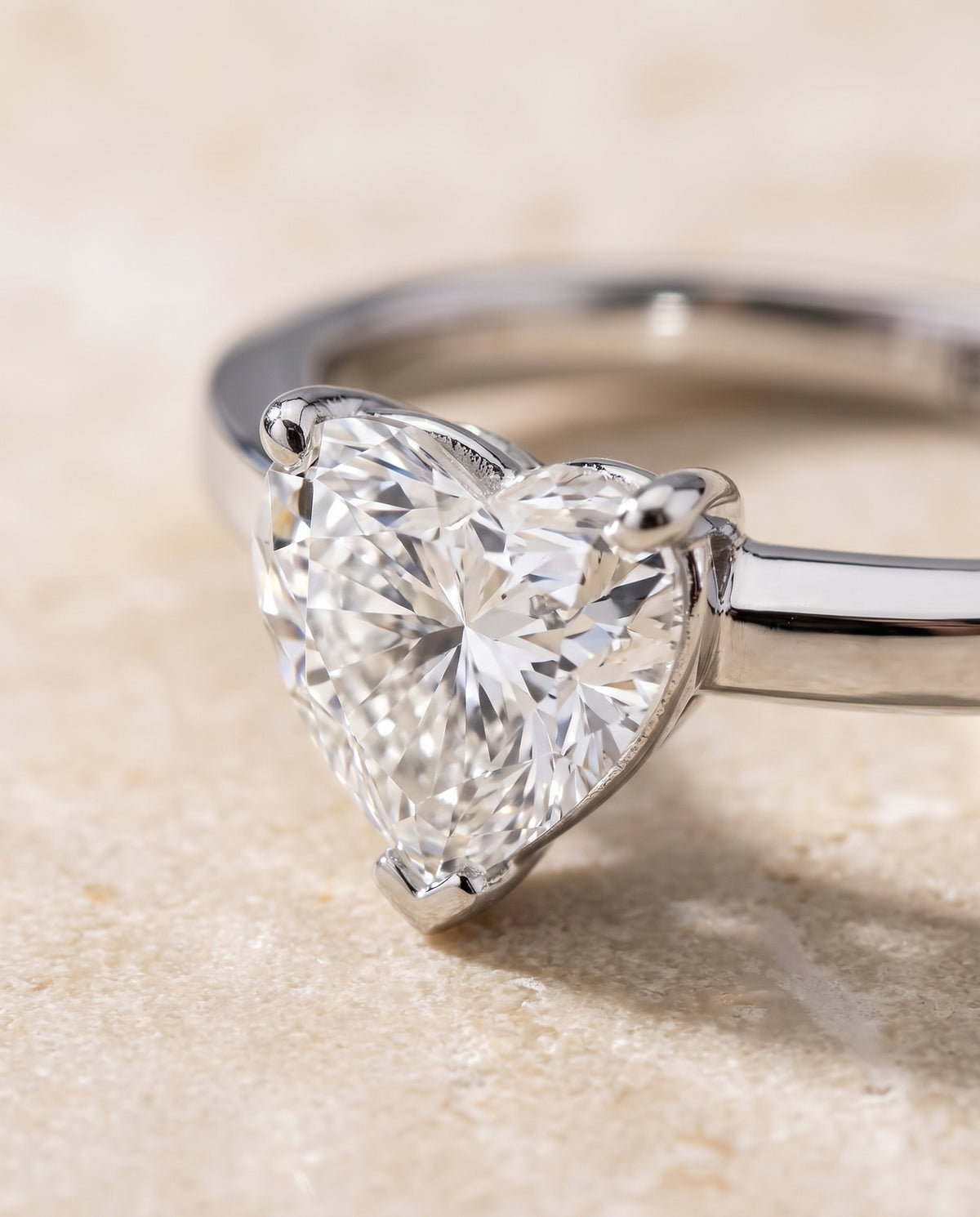 The Carmen Beveled Edge Comfort Fit Solitaire Heart Engagement Ring Setting in Platinum