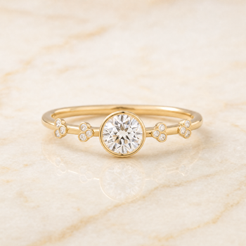 The Miley Clover Bezel Accent Solitaire Round Engagement Ring Setting in 18K Yellow Gold