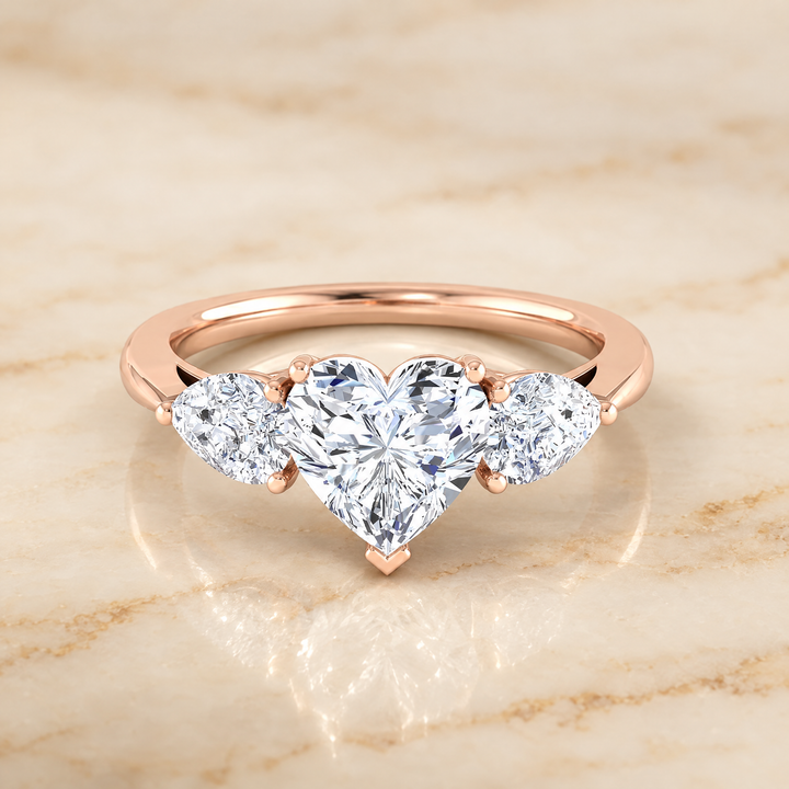 The Angelica Three Stone Matched Heart Engagement Ring Setting in 14K Rose Gold
