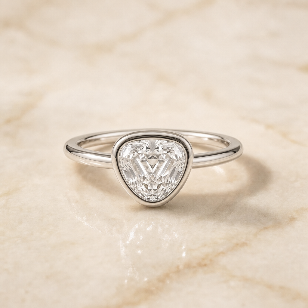 The Agnes Bezel Solitaire In Shield Engagement Ring Setting in 18K White Gold