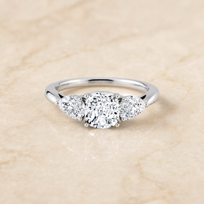 The Angelica Three Stone Matched Cushion Cut Engagement Ring Setting in 18K White Gold