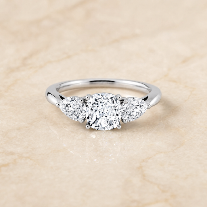 The Angelica Three Stone Matched Cushion Cut Engagement Ring Setting in Platinum