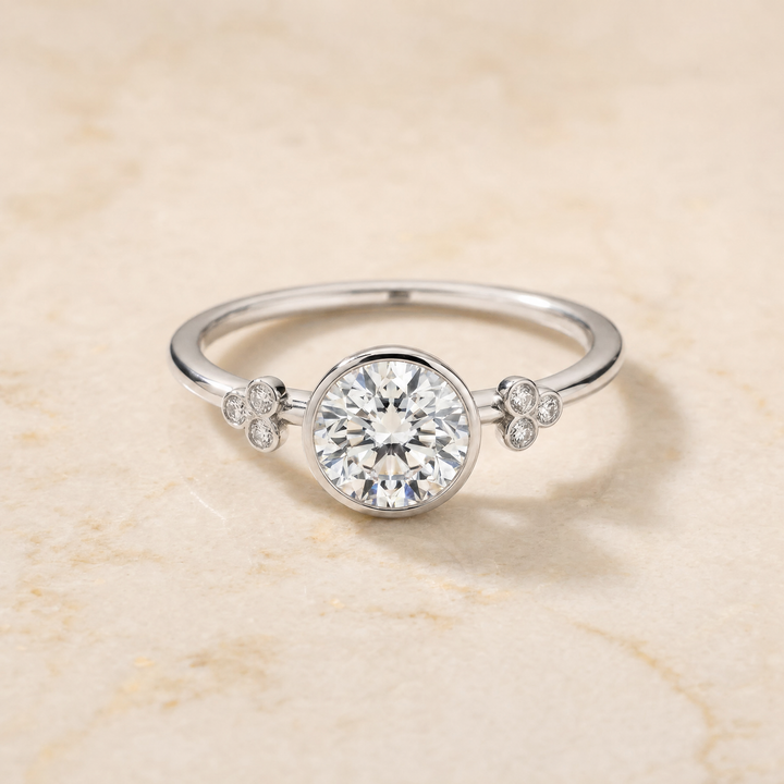 The Selena Clover Bezel Accent Solitaire Round Engagement Ring Setting in Platinum