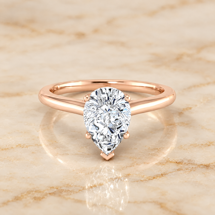 The Gladys Pinched Cathedral Solitaire Pear Engagement Ring Setting in 14K Rose Gold