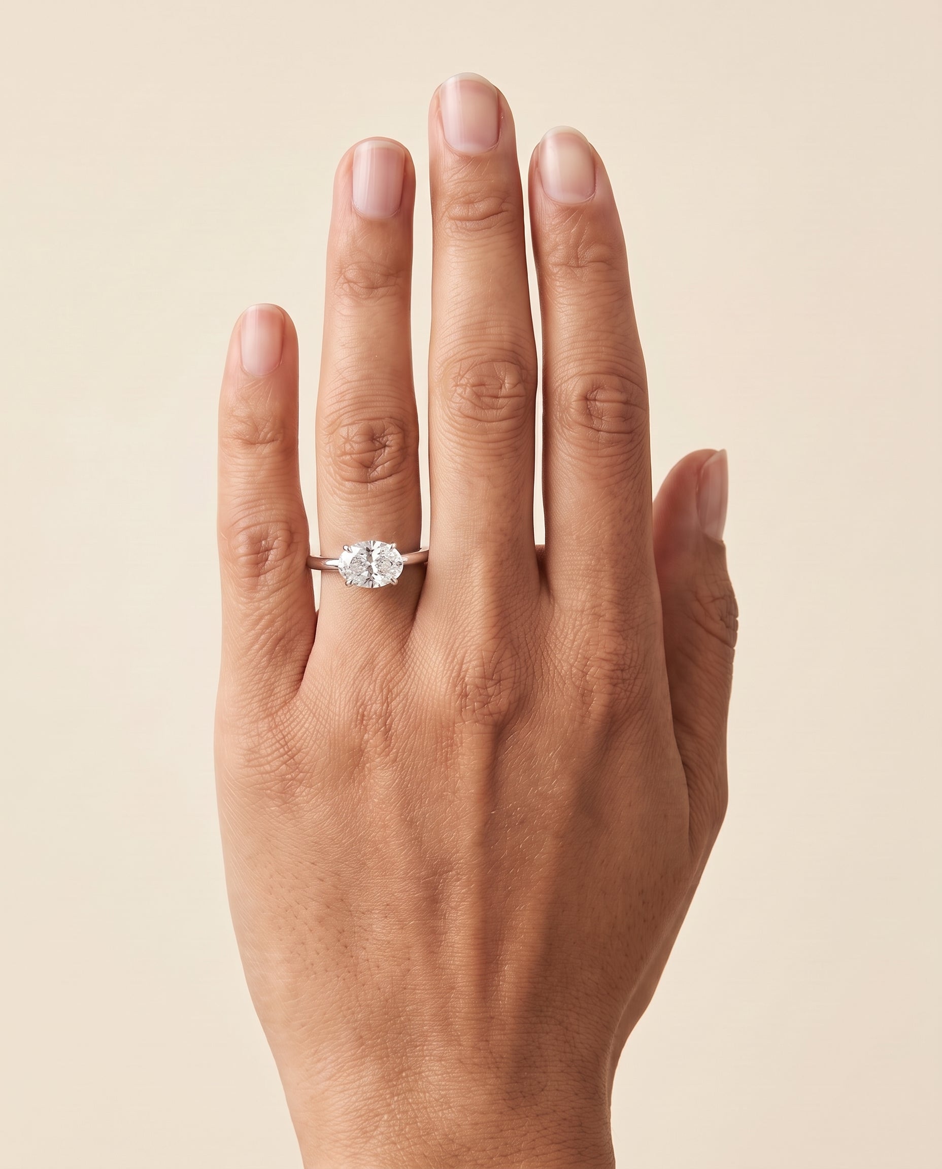 The Spring East West Eight Claw Comfort Fit Solitaire Oval Engagement Ring Setting in 18K White Gold