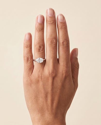 The Spring East West Eight Claw Comfort Fit Solitaire Oval Engagement Ring Setting in 18K White Gold