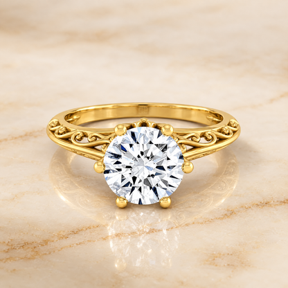 The Layla Vintage Scroll Cutout Solitaire Round Engagement Ring Setting in 18K Yellow Gold